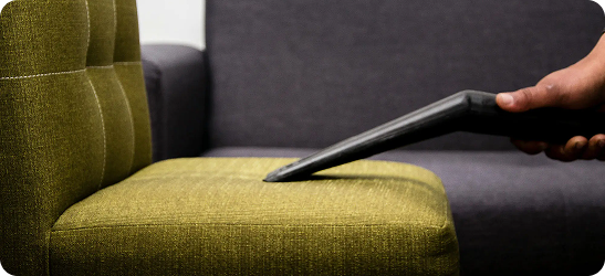 Upholstery cleaning on sofa