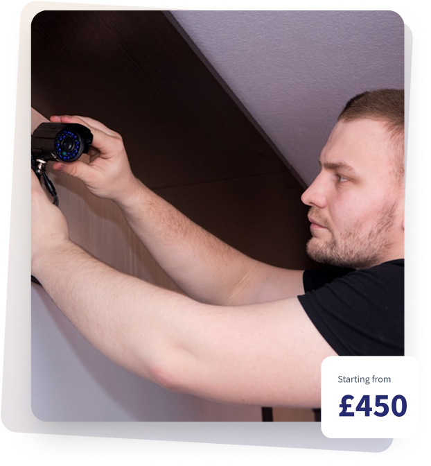 Surveyor inspecting damp and mould on wall