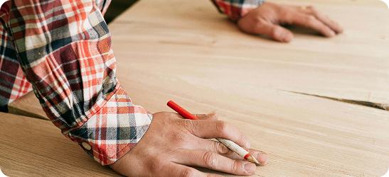 Handyman laying flooring